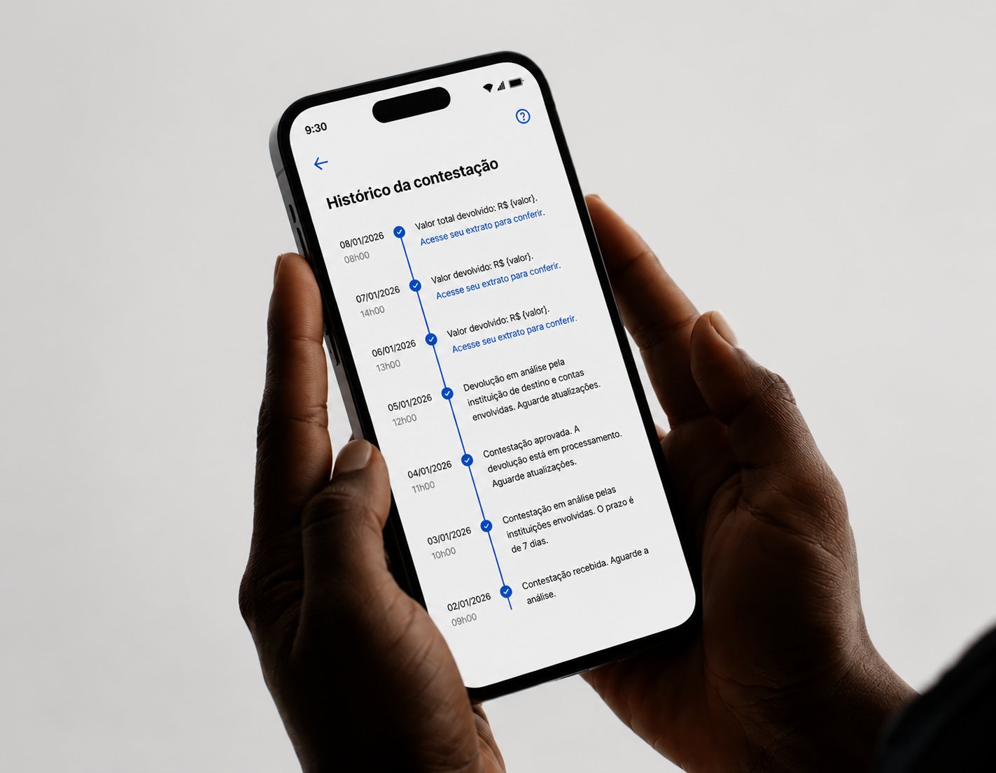 Mão segurando celular com o histórico de uma contestação Pix